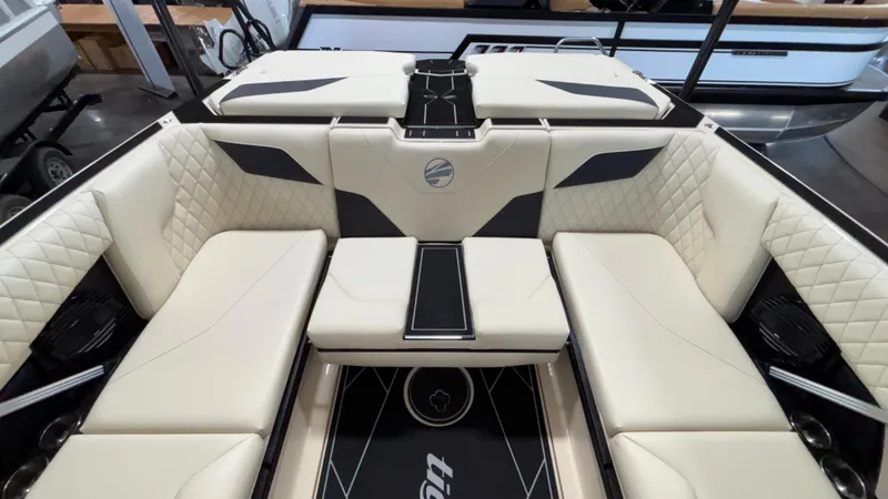 Slide: The Image of Luxurious interior of 2025 Tigé Z5 boat with quilted seating and sleek design. - 34