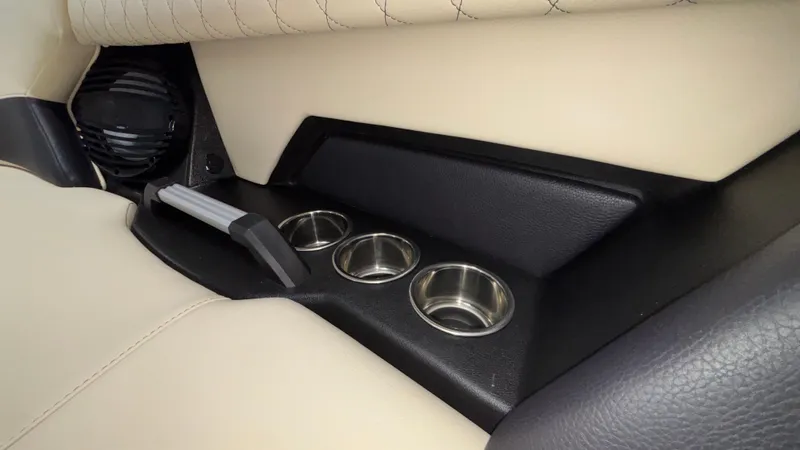 Slide: The Image of Interior of 2025 Tigé Z5 boat with cup holders and speaker. - 40