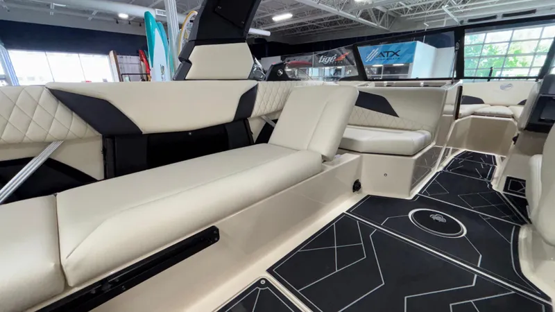 Slide: The Image of 2025 Tigé Z5 boat interior with beige seating and modern design. - 48