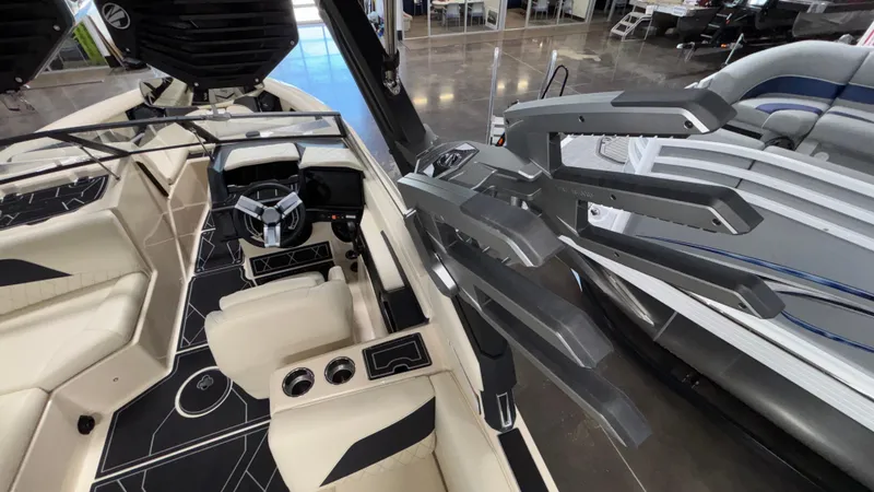 Slide: The Image of 2025 Tigé Z5 boat interior with modern steering and seating design. - 49