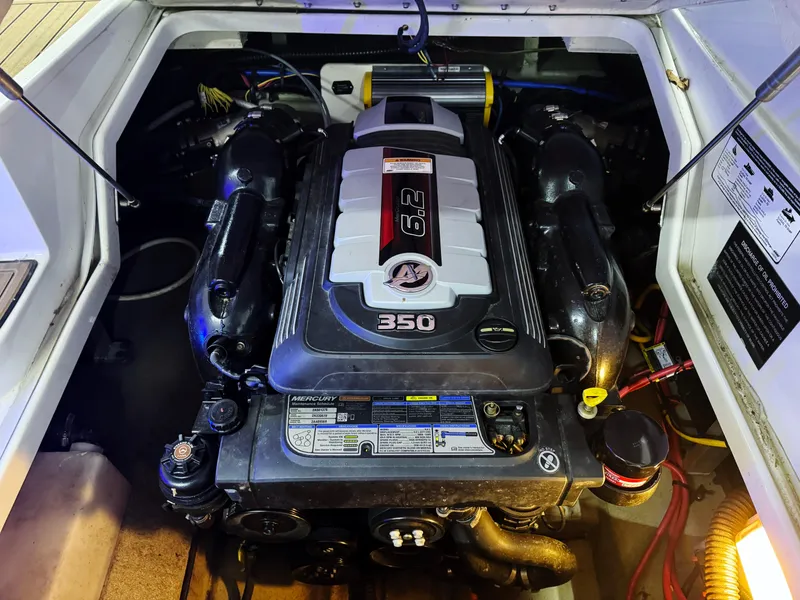 Slide: The Image of Engine compartment of a 2016 Crownline 270 SS boat featuring a Mercury 6.2L engine. - 20