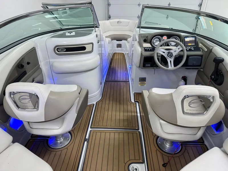 Slide: The Image of Interior of a 2016 Crownline 270 SS boat with modern seating and dashboard. - 9