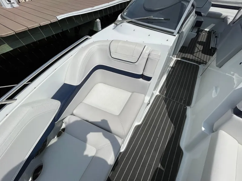 Slide: The Image of 2014 Formula 270 Bowrider interior with white seating and striped flooring. - 15