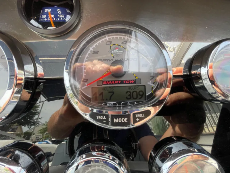 Slide: The Image of Dashboard of a 2014 Formula 270 Bowrider boat showing RPM and voltage gauges. - 26