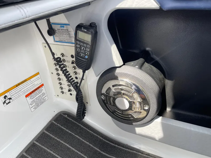 Slide: The Image of Interior of a 2014 Formula 270 Bowrider featuring a speaker and communication device. - 29