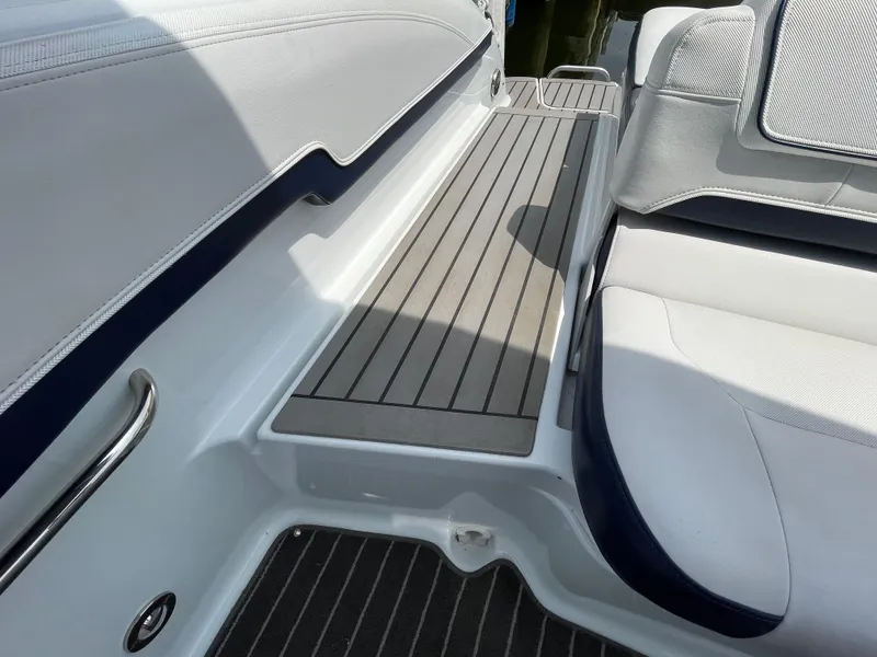 Slide: The Image of 2014 Formula 270 Bowrider interior with white seating and teak-style flooring. - 43