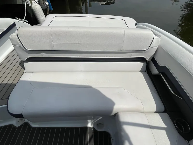 Slide: The Image of 2014 Formula 270 Bowrider boat interior seating with white upholstery. - 45