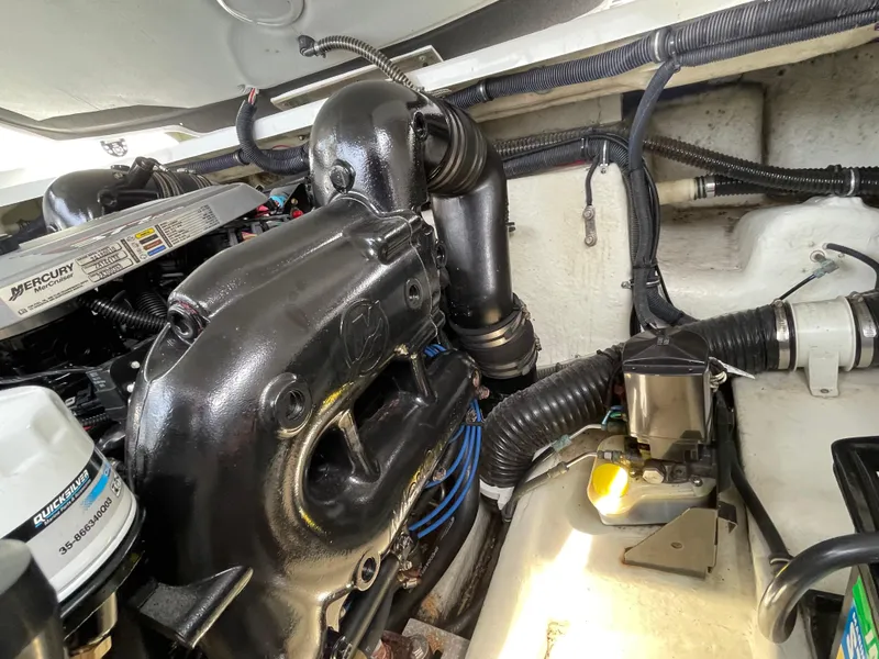 Slide: The Image of Engine compartment of a 2014 Formula 270 Bowrider with Mercury MerCruiser components. - 53