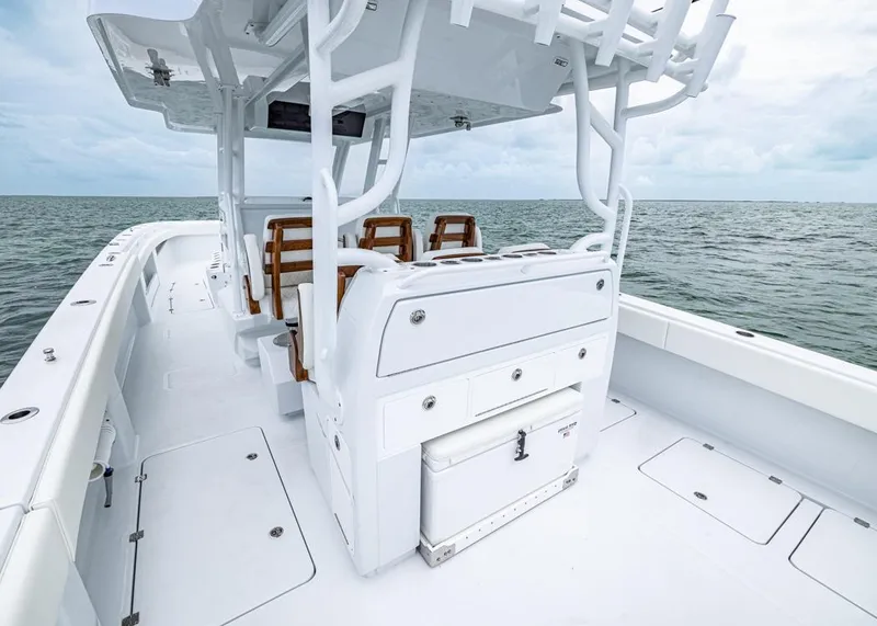 Slide: The Image of 2026 Invincible 40 Catamaran on open water, showcasing sleek design and spacious deck. - 21