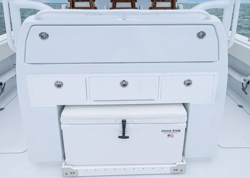 Slide: The Image of Invincible 40 Catamaran 2026 with storage drawers and cooler on deck. - 24