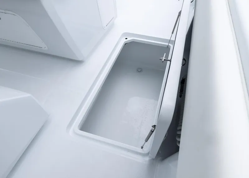 Slide: The Image of Open storage compartment on 2026 Invincible 40 Catamaran, showcasing sleek design and functionality. - 32