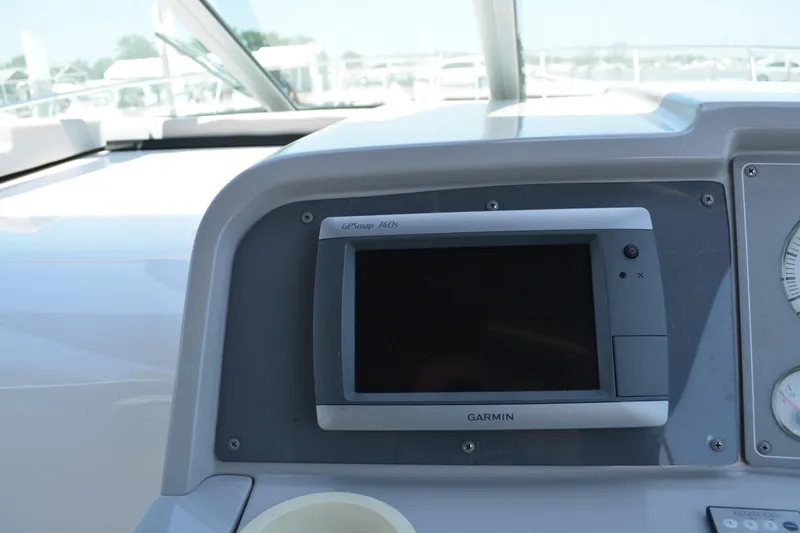 Slide: The Image of Garmin GPS display on 1998 Formula 31 PC boat dashboard. - 15