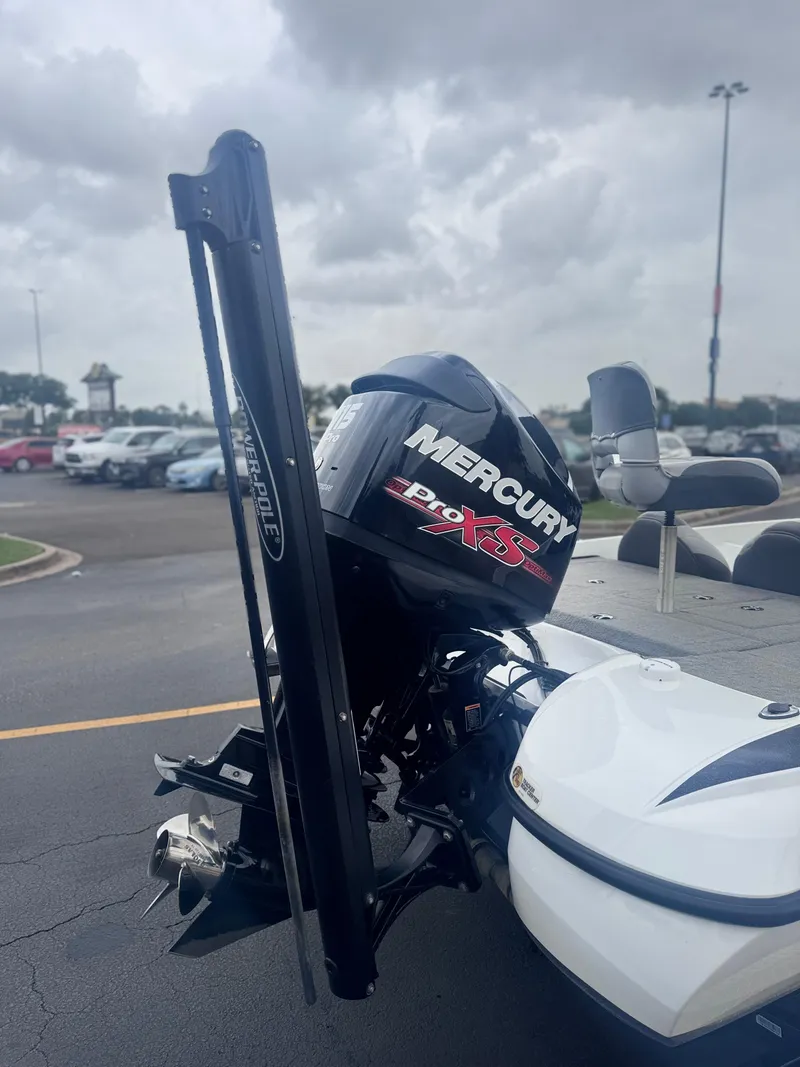 Slide: The Image of 2015 Nitro Z6 SC boat with Mercury Pro XS engine in parking lot. - 15