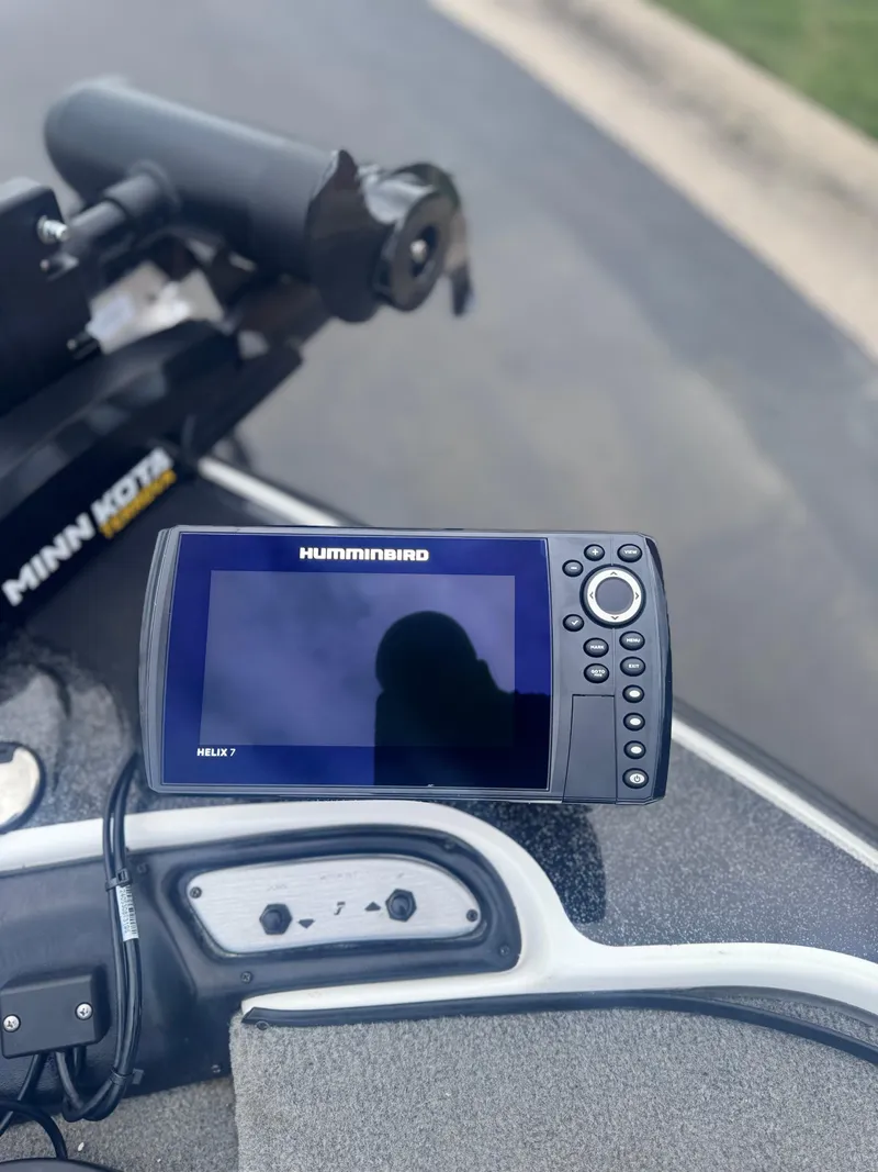 Slide: The Image of Humminbird Helix 7 fish finder on a 2015 Nitro Z6 SC boat dashboard. - 4