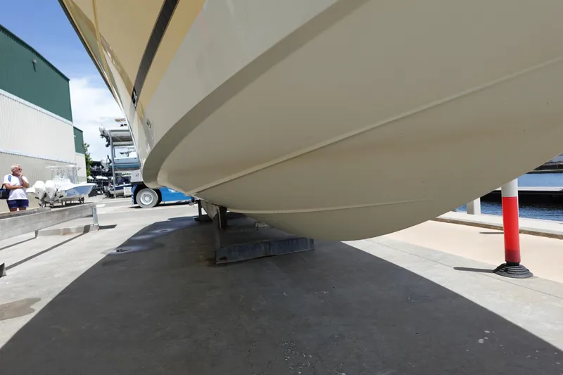 Slide: The Image of 2005 Hydra-Sports Vector 3300 CC boat hull on a trailer at a marina. - 14