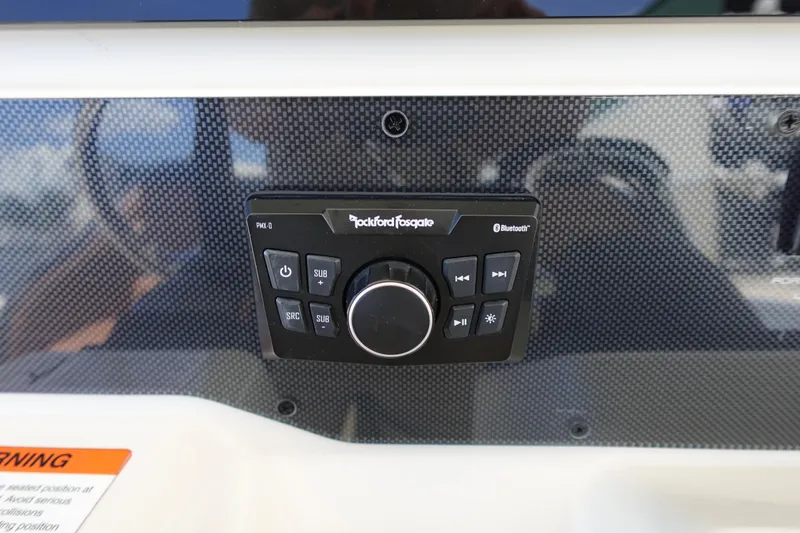 Slide: The Image of Control panel of a 2005 Hydra-Sports Vector 3300 CC with Rockford Fosgate Bluetooth system. - 32