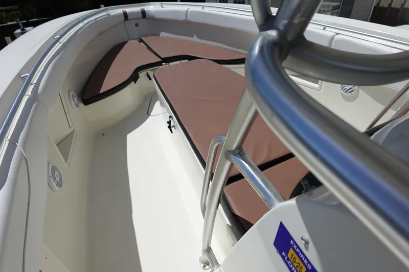 Slide: The Image of 2005 Hydra-Sports Vector 3300 CC boat interior with cushioned seating and stainless steel railing. - 8