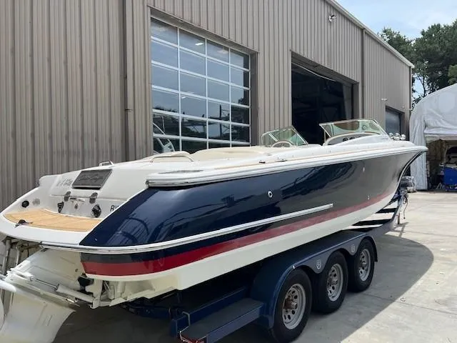 Slide: The Image of 2008 Chris-Craft Launch 28 boat docked, rear view, with "Out of Office" text, Rye, NY. - 3