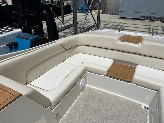 Slide: The Image of 2008 Chris-Craft Launch 28 boat dashboard with steering wheel and gauges. - 9