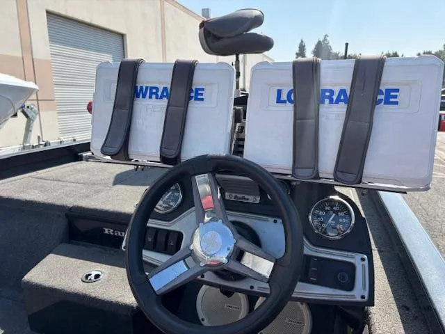 Slide: The Image of 2017 Ranger RT198P boat dashboard with dual Lowrance displays and steering wheel. - 4