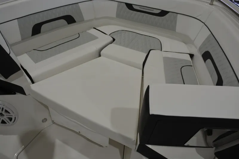 Slide: The Image of 2026 Blackfin 272 CC boat interior with cushioned seating and modern design. - 30