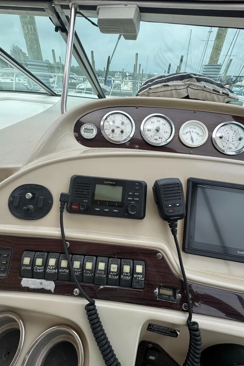 Slide: The Image of Control panel of 2004 Chaparral 330 Signature boat with gauges and navigation equipment. - 6
