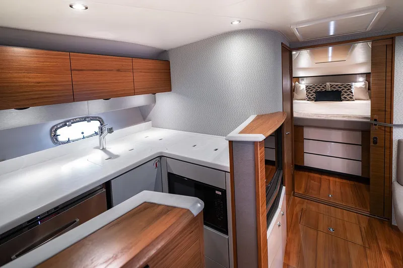 Slide: The Image of Manufacturer Provided Image: Modern kitchen and bedroom interior of 2022 Tiara Yachts 39 Open. - 13