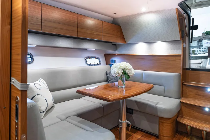 Slide: The Image of Manufacturer Provided Image: 2022 Tiara Yachts 39 Open interior with dining area and modern furnishings. - 9