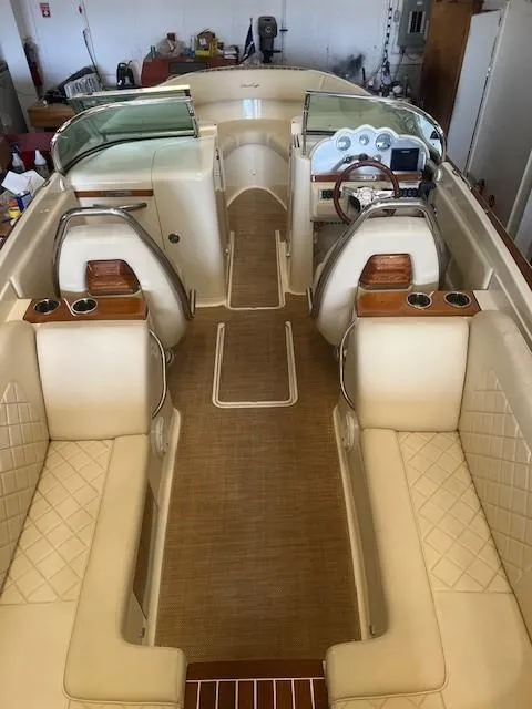 Slide: The Image of 2020 Chris-Craft Launch 27 interior with luxurious seating and elegant dashboard design. - 10