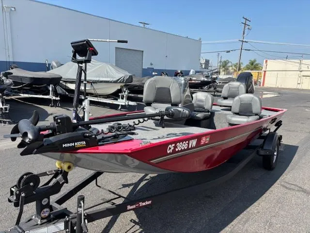 Slide: The Image of 2024 Tracker Bass Tracker Classic XL boat on trailer in outdoor lot. - 3