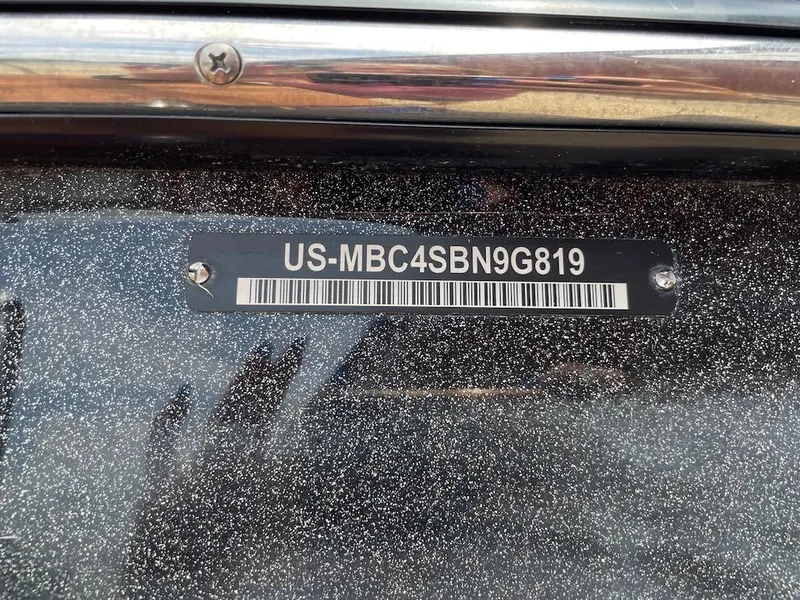 Slide: The Image of 2019 MasterCraft XT23 boat identification plate with serial number and barcode. - 19