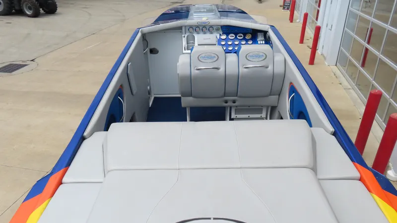 Slide: The Image of 2007 Active Thunder 37 boat interior with dual seats and control panel. - 11