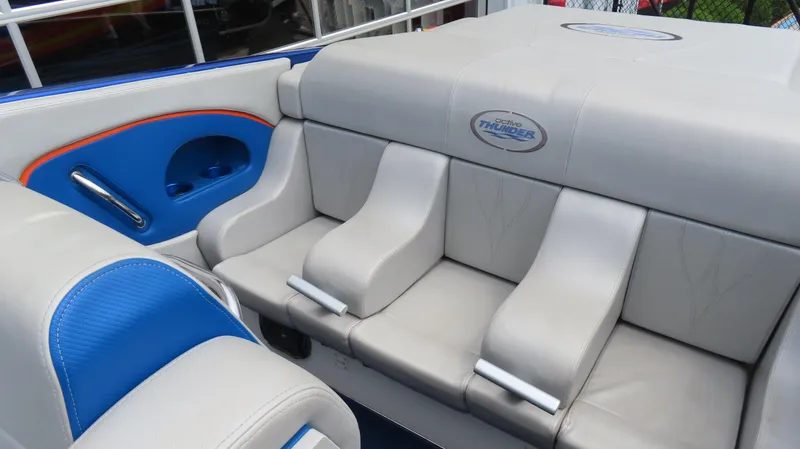 Slide: The Image of 2007 Active Thunder 37 boat interior with gray and blue seating. - 16