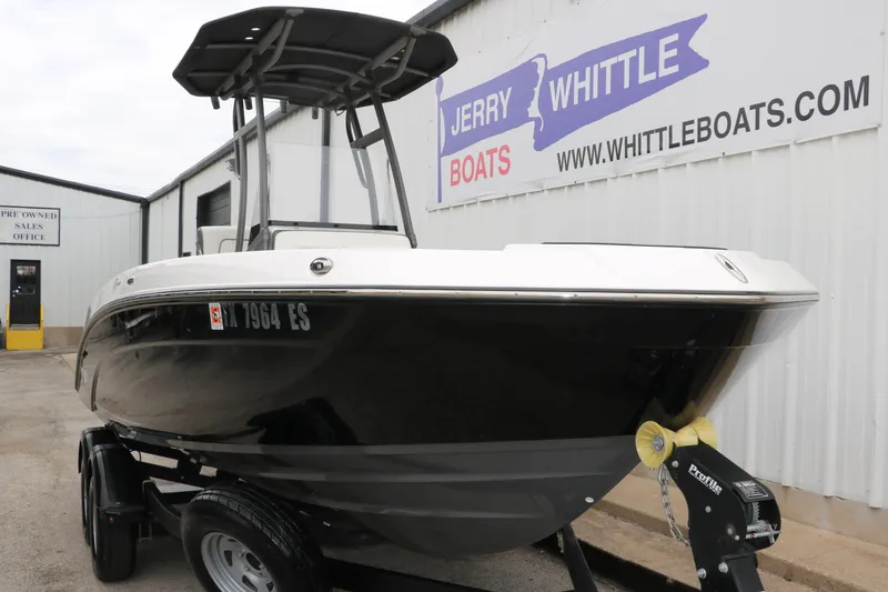 Slide: The Image of 2019 Yamaha Boats 210 FSH Sport on trailer at Jerry Whittle Boats dealership. - 5