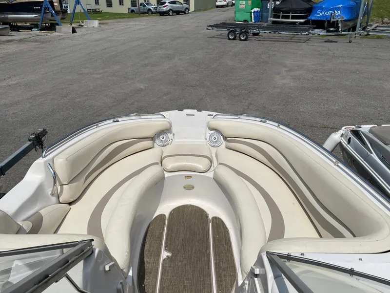 Slide: The Image of 2007 Starcraft 2410 OB Limited boat with spacious seating and clean interior. - 13