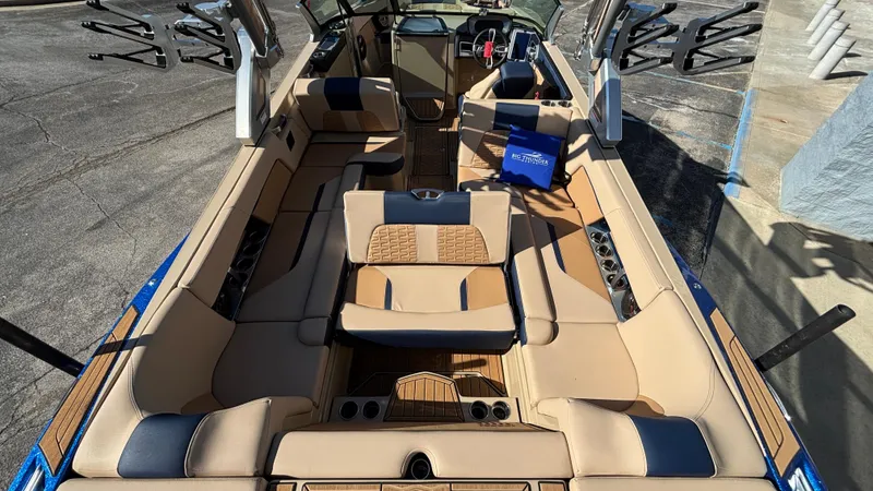 Slide: The Image of 2022 MasterCraft X26 boat interior with luxurious seating and modern design features. - 18