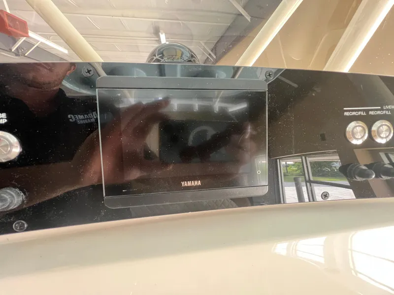 Slide: The Image of Control panel of 2026 Pioneer 220 Bay Sport boat with Yamaha display. - 11