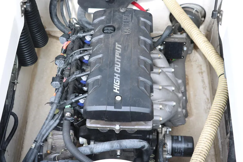 Slide: The Image of 2014 Yamaha SX190 engine compartment showcasing high output motor components. - 20