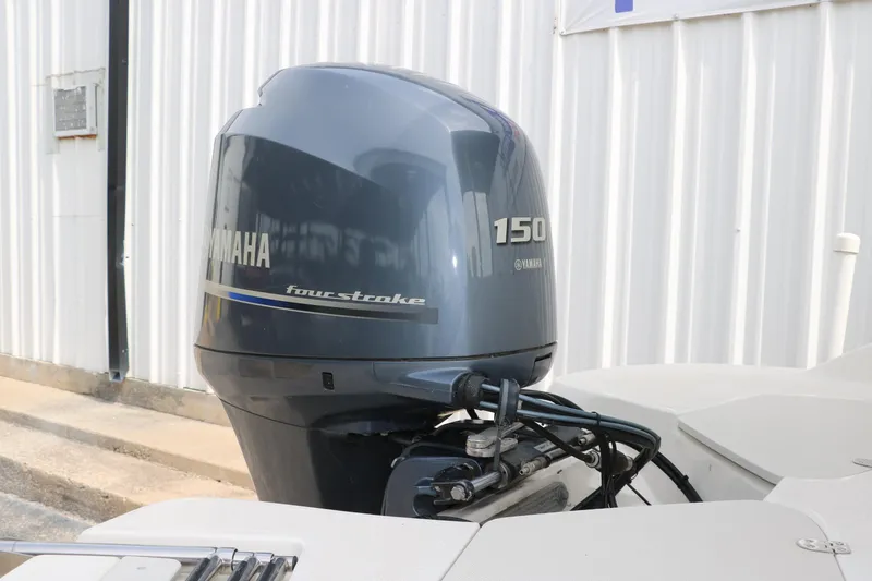 Slide: The Image of Yamaha 150 four-stroke outboard motor on 2015 Stingray 192 SC boat. - 12