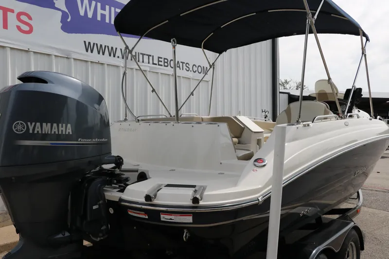 Slide: The Image of 2015 Stingray 192 SC boat with Yamaha outboard motor, displayed at Whittle Boats dealership. - 3
