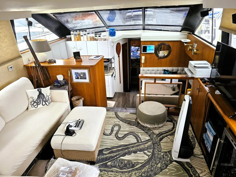 Slide: The Image of Interior of a 1995 Silverton 46 yacht with modern decor and nautical accents. - 8