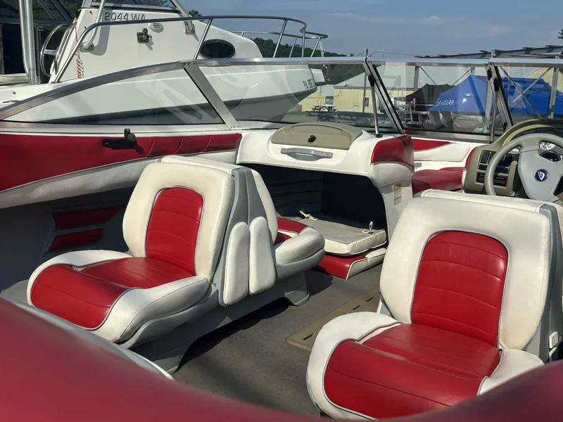 Slide: The Image of Interior of a 1993 Glastron SSV 175 boat with red and white seating. - 7