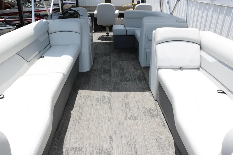 Slide: The Image of Interior of 2022 Crest Classic Fish 220 pontoon boat with spacious seating and modern design. - 11