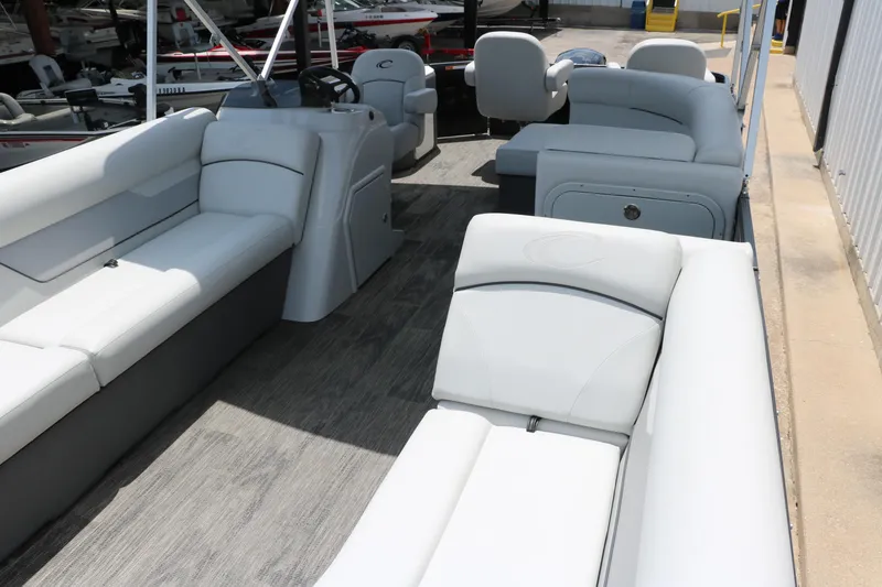 Slide: The Image of 2022 Crest Classic Fish 220 pontoon boat interior with spacious seating and modern design. - 12