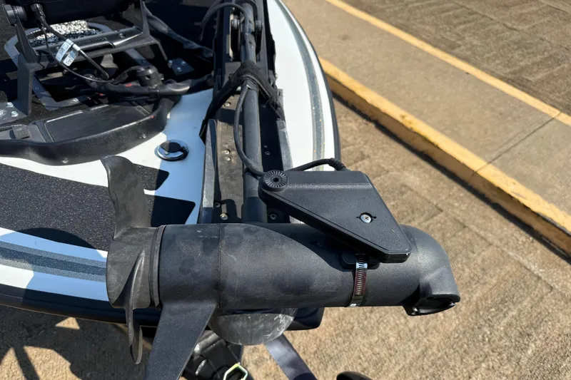 Slide: The Image of 2004 Skeeter ZX250 boat with trolling motor and propeller detail. - 23