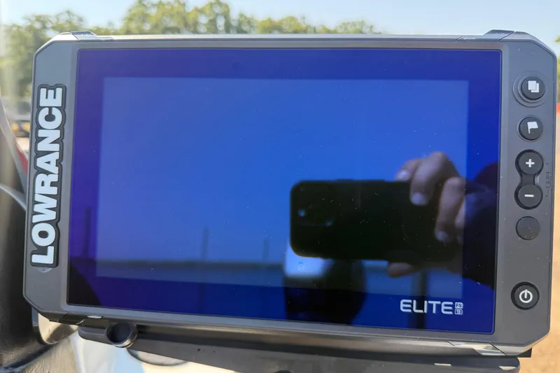 Slide: The Image of Lowrance Elite FS display on a 2004 Skeeter ZX250 boat dashboard. - 30