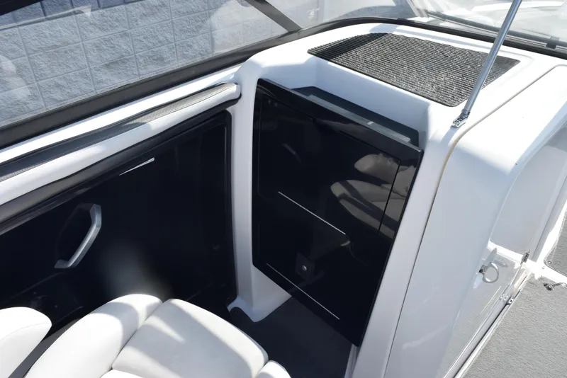 Slide: The Image of 2017 Yamaha AR240 boat interior with sleek black and white design elements. - 12