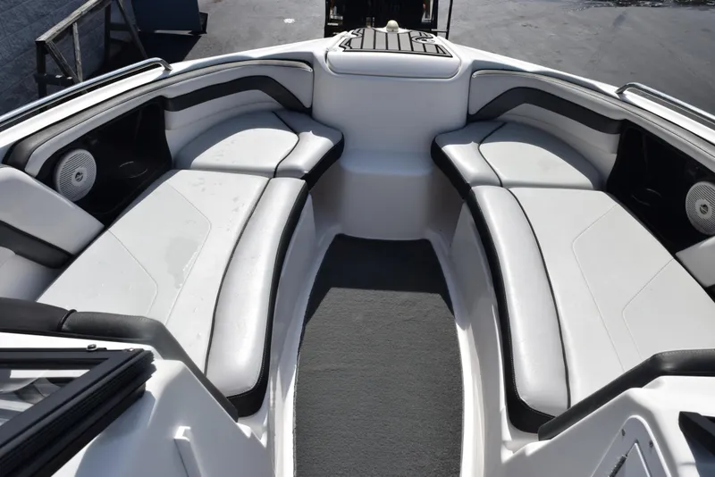 Slide: The Image of 2017 Yamaha Boats AR240 interior with spacious seating and modern design. - 14