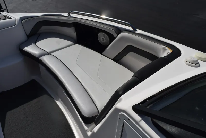 Slide: The Image of 2017 Yamaha AR240 boat interior seating with sleek design and comfortable cushions. - 15