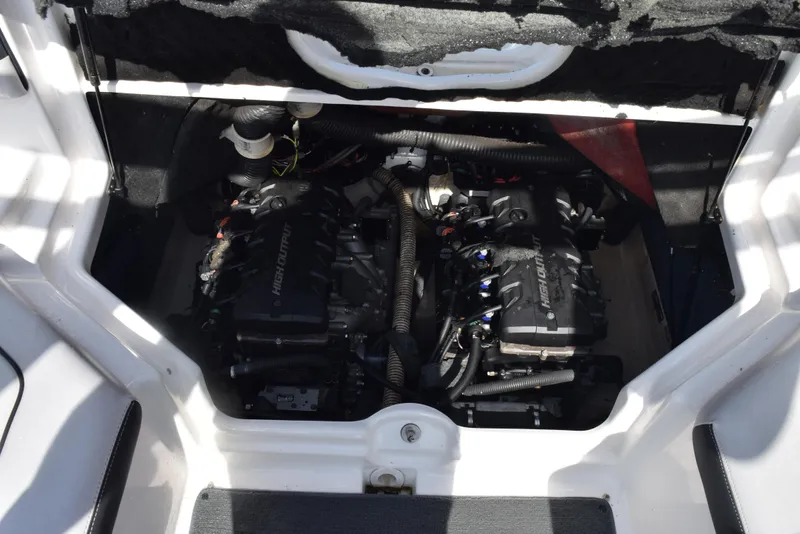 Slide: The Image of Engine compartment of a 2017 Yamaha AR240 boat, showcasing dual high-output engines. - 23